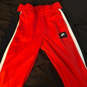 Red nike joggers